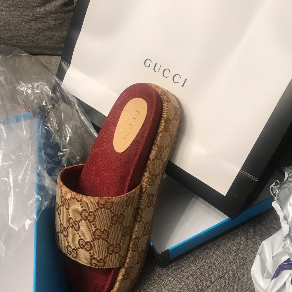 New platform slides size 8. Worn twice (Brown)